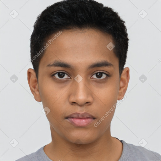 Neutral latino young-adult male with short  black hair and brown eyes