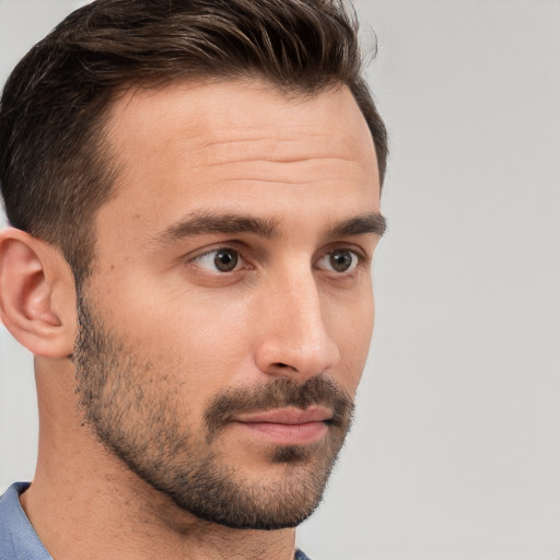 Neutral white young-adult male with short  brown hair and brown eyes