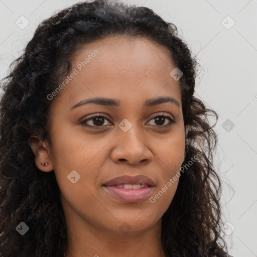 Joyful latino young-adult female with long  brown hair and brown eyes