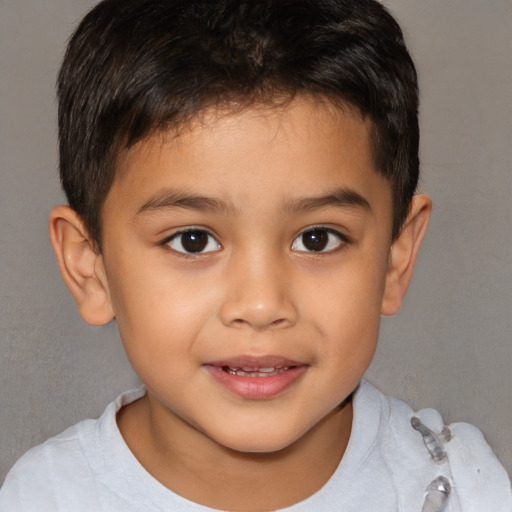 Joyful white child male with short  brown hair and brown eyes