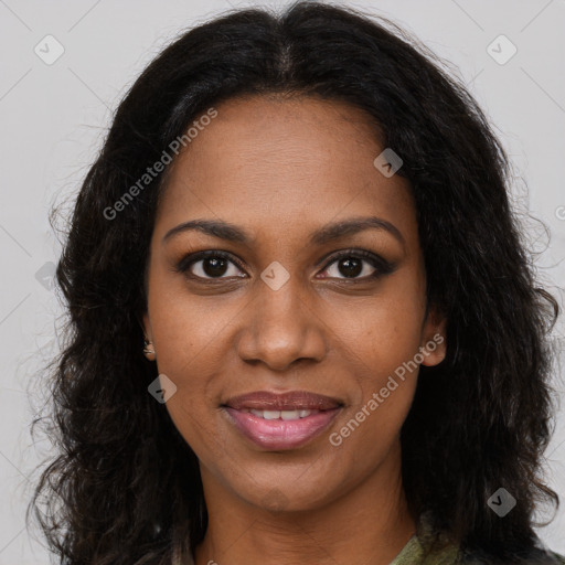 Joyful black young-adult female with long  brown hair and brown eyes