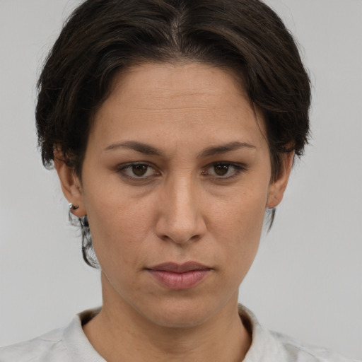 Neutral white adult female with short  brown hair and brown eyes