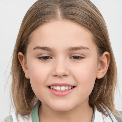 Joyful white child female with medium  brown hair and brown eyes