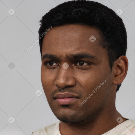 Neutral black young-adult male with short  black hair and brown eyes