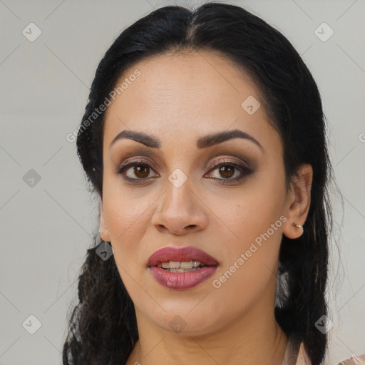 Joyful latino young-adult female with long  black hair and brown eyes