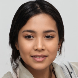 Joyful asian young-adult female with medium  black hair and brown eyes