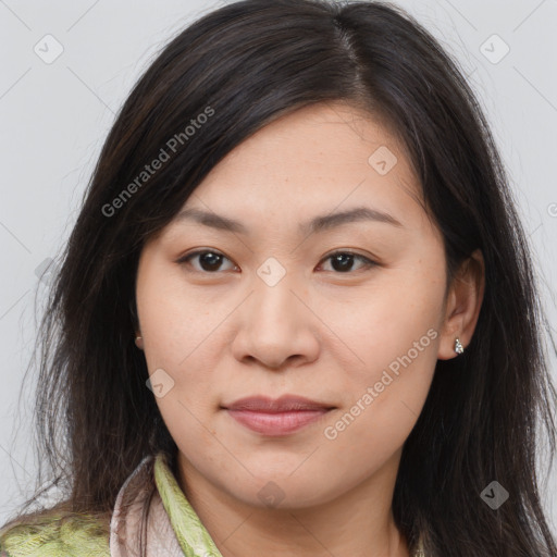 Joyful asian young-adult female with long  brown hair and brown eyes