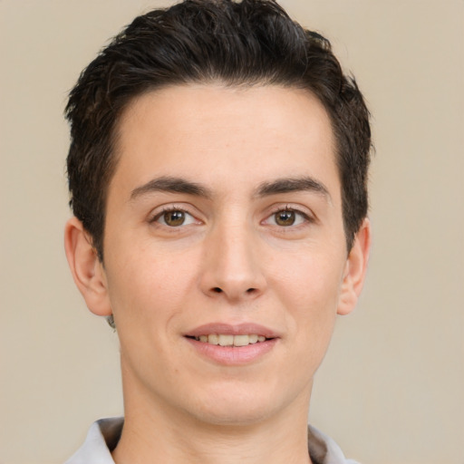 Joyful white young-adult male with short  brown hair and brown eyes