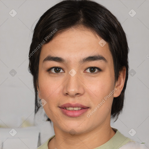 Joyful asian young-adult female with medium  black hair and brown eyes