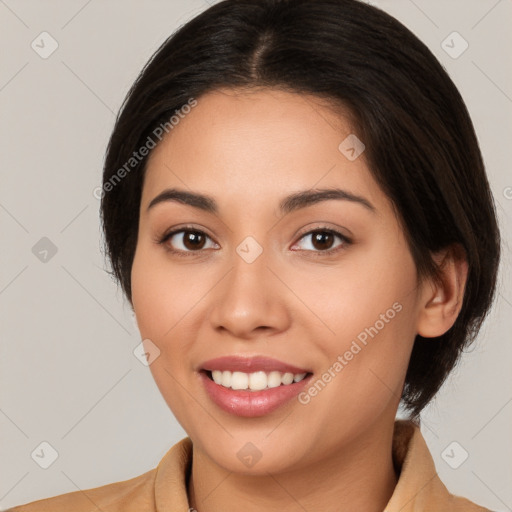 Joyful white young-adult female with medium  brown hair and brown eyes