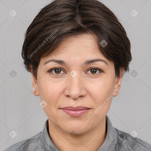 Joyful white adult female with short  brown hair and brown eyes