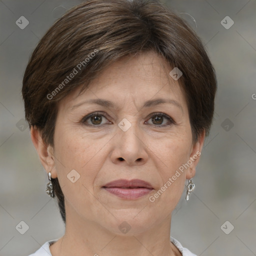 Joyful white adult female with short  brown hair and brown eyes