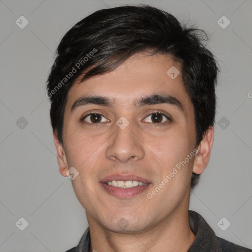 Joyful white young-adult male with short  black hair and brown eyes