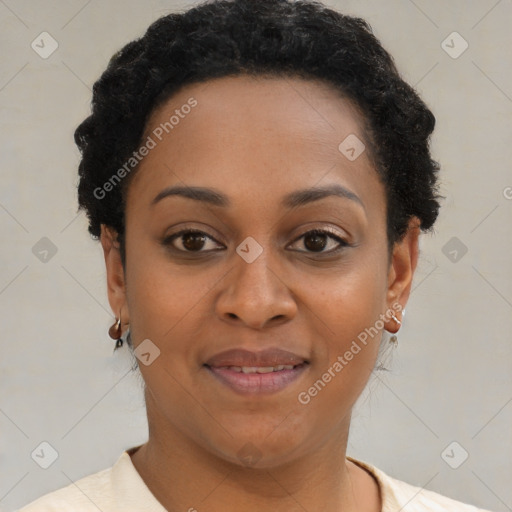 Joyful black young-adult female with short  brown hair and brown eyes