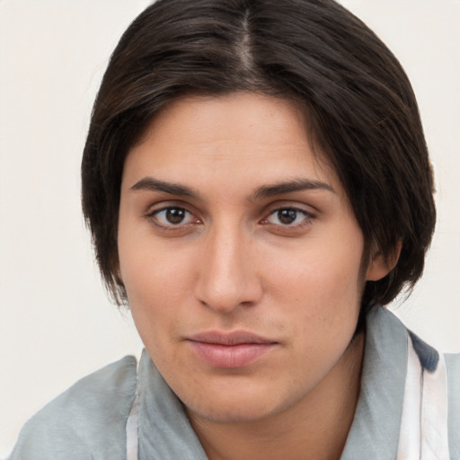 Neutral white young-adult female with medium  brown hair and brown eyes