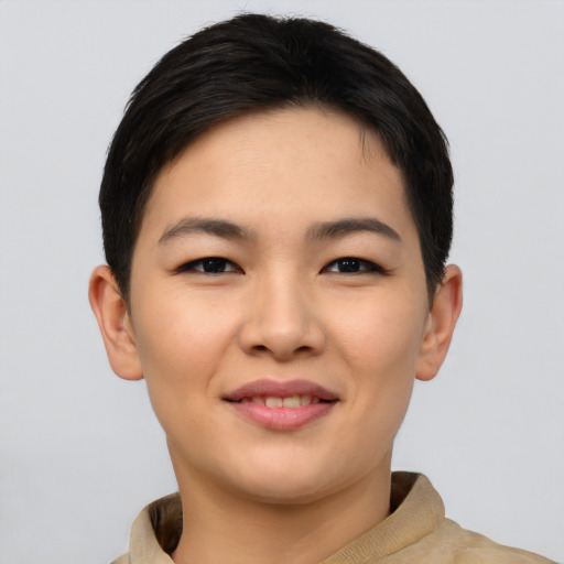 Joyful asian young-adult female with short  brown hair and brown eyes