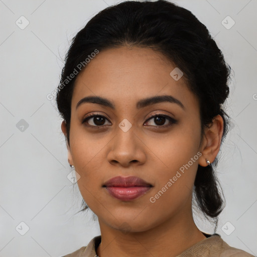 Joyful latino young-adult female with medium  black hair and brown eyes