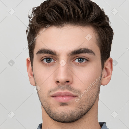 Neutral white young-adult male with short  brown hair and brown eyes