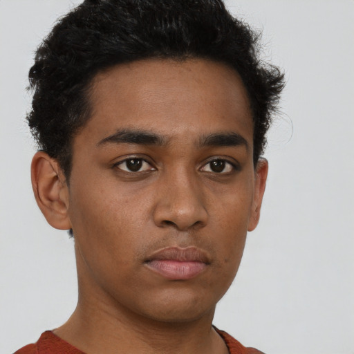 Neutral latino young-adult male with short  brown hair and brown eyes