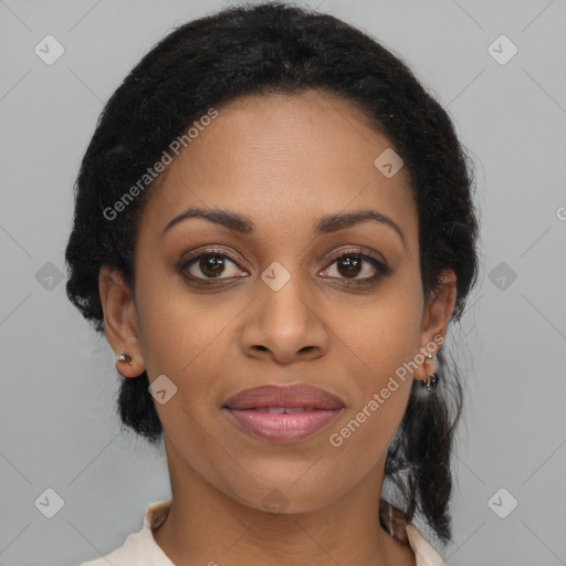 Joyful black young-adult female with medium  brown hair and brown eyes