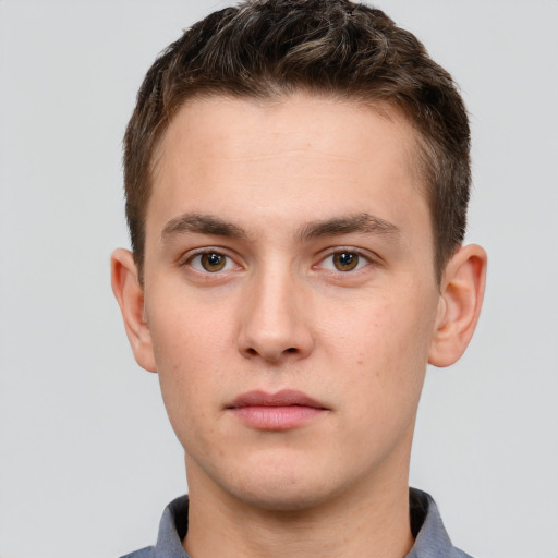 Neutral white young-adult male with short  brown hair and brown eyes