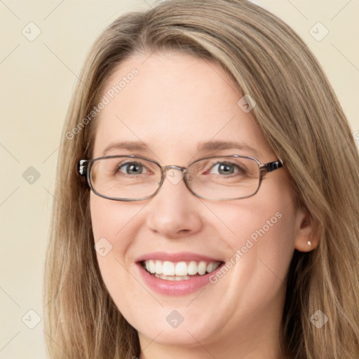 Joyful white young-adult female with long  brown hair and green eyes