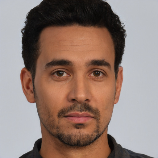 Neutral latino young-adult male with short  black hair and brown eyes