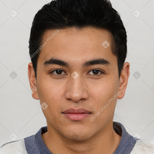 Neutral latino young-adult male with short  brown hair and brown eyes