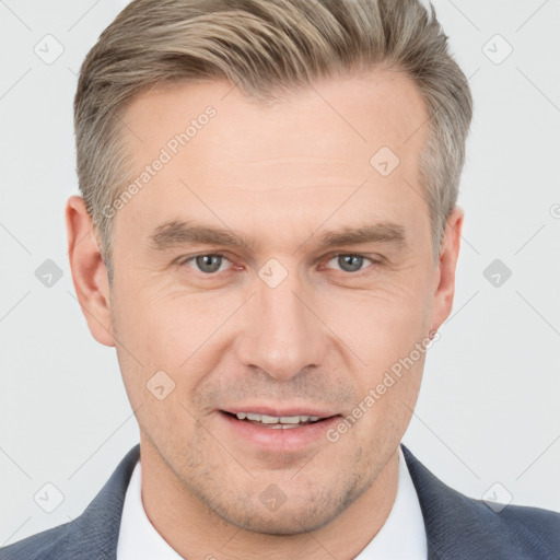 Joyful white adult male with short  brown hair and grey eyes