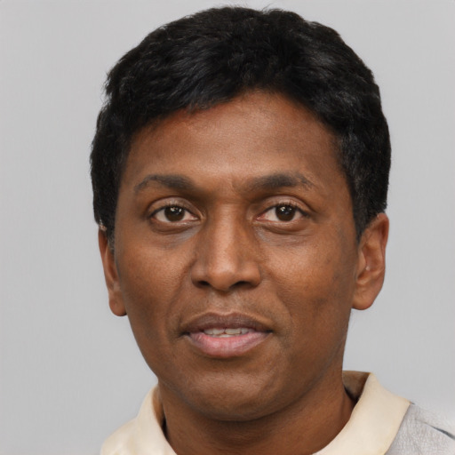 Neutral black adult male with short  black hair and brown eyes