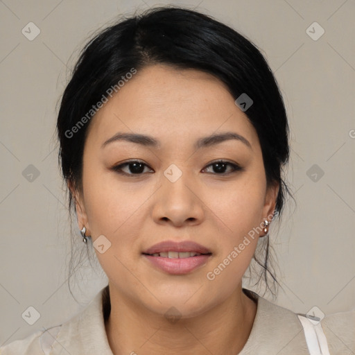 Joyful asian young-adult female with medium  black hair and brown eyes