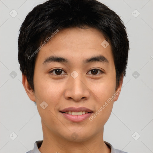 Joyful asian young-adult male with short  brown hair and brown eyes