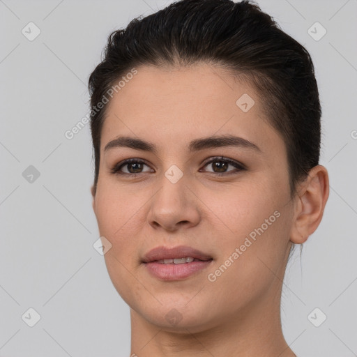 Joyful white young-adult female with short  brown hair and brown eyes