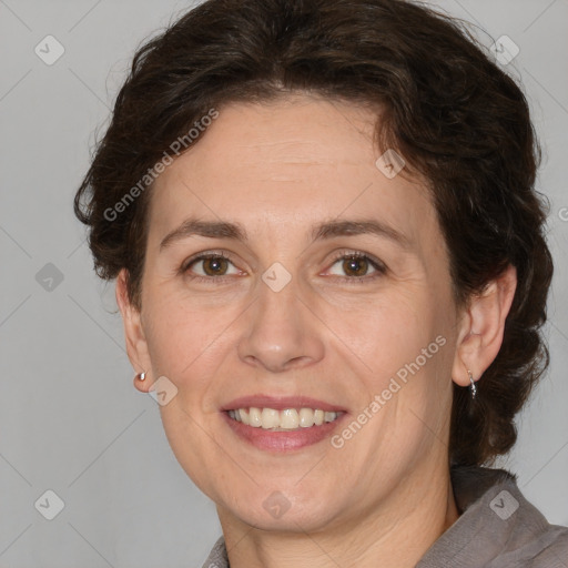 Joyful white adult female with short  brown hair and brown eyes