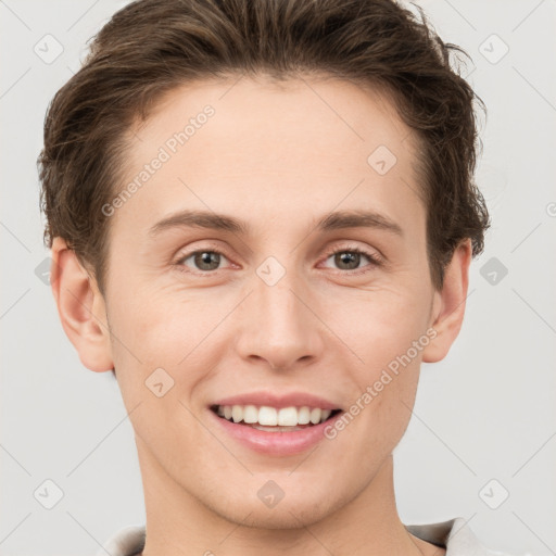 Joyful white young-adult female with short  brown hair and grey eyes