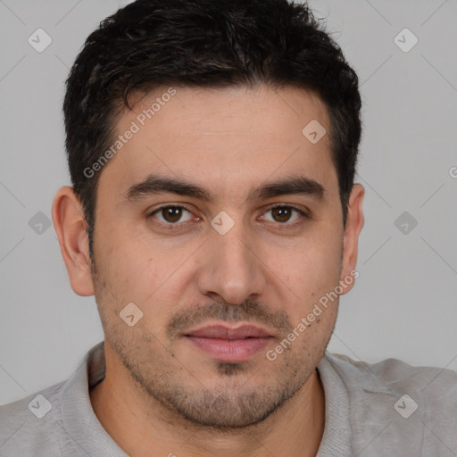 Joyful white young-adult male with short  brown hair and brown eyes