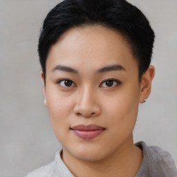 Joyful asian young-adult female with short  black hair and brown eyes