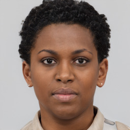 Neutral black young-adult female with short  brown hair and brown eyes