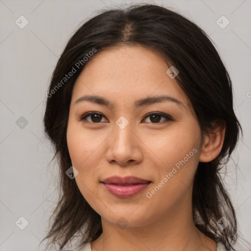 Joyful asian young-adult female with medium  brown hair and brown eyes