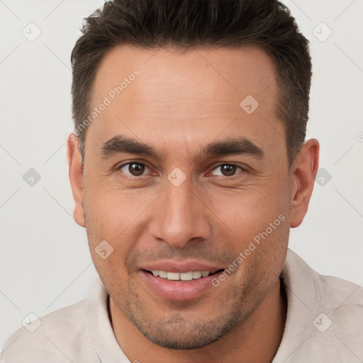 Joyful white young-adult male with short  brown hair and brown eyes