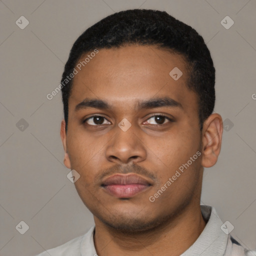 Neutral latino young-adult male with short  black hair and brown eyes