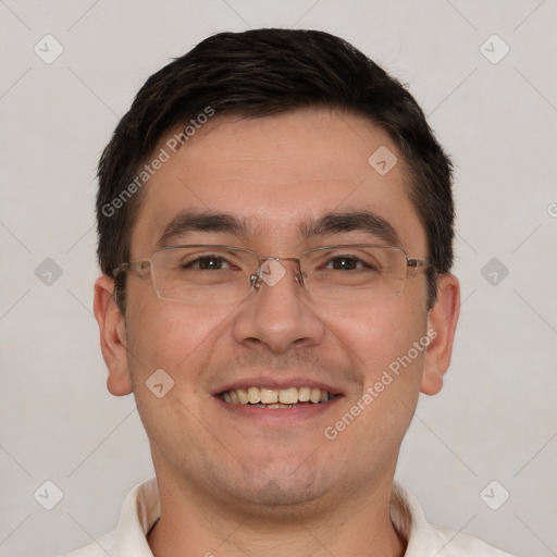 Joyful white adult male with short  brown hair and brown eyes