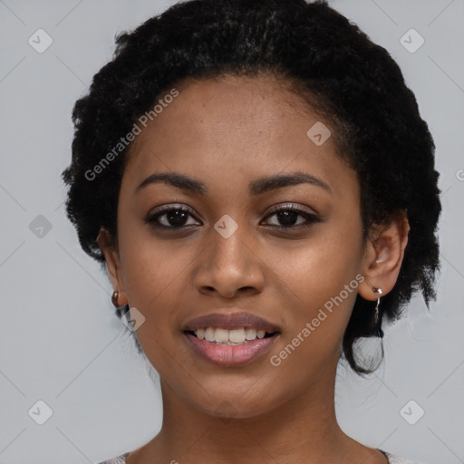 Joyful latino young-adult female with short  black hair and brown eyes