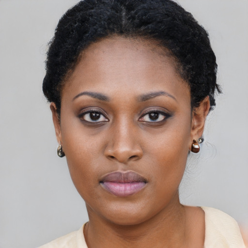 Neutral black young-adult female with short  black hair and brown eyes