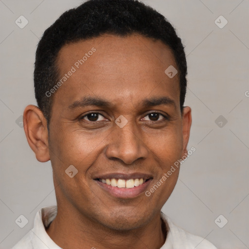 Joyful latino adult male with short  black hair and brown eyes