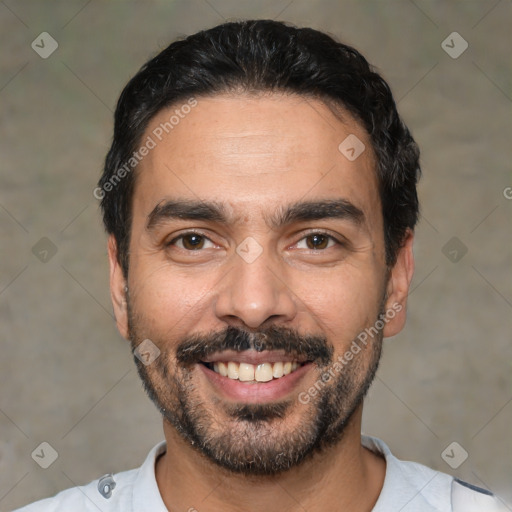 Joyful latino adult male with short  black hair and brown eyes