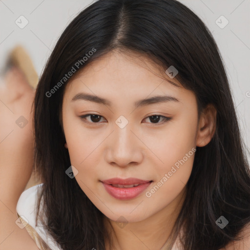 Joyful asian young-adult female with long  brown hair and brown eyes