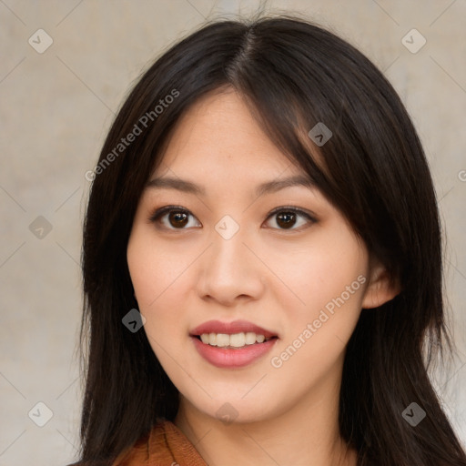 Joyful asian young-adult female with long  brown hair and brown eyes