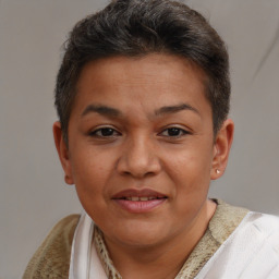 Joyful white adult female with short  brown hair and brown eyes