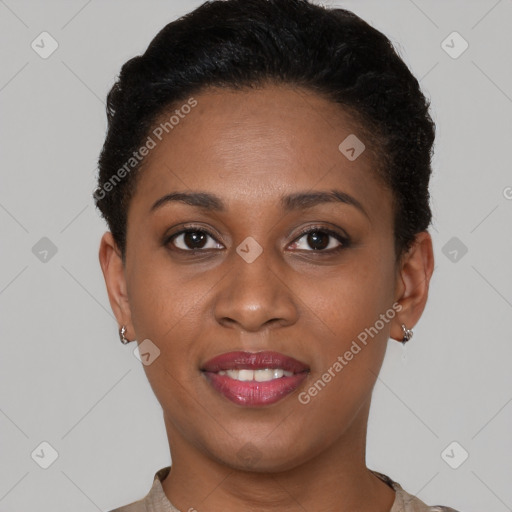 Joyful black young-adult female with short  brown hair and brown eyes